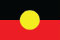 Aboriginal flag, black top half, red lower half, with a yellow disc in the middle